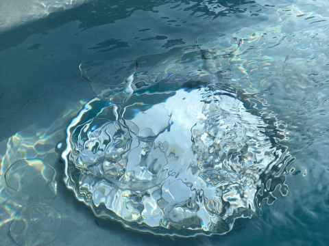 clean blue water rippling in basin