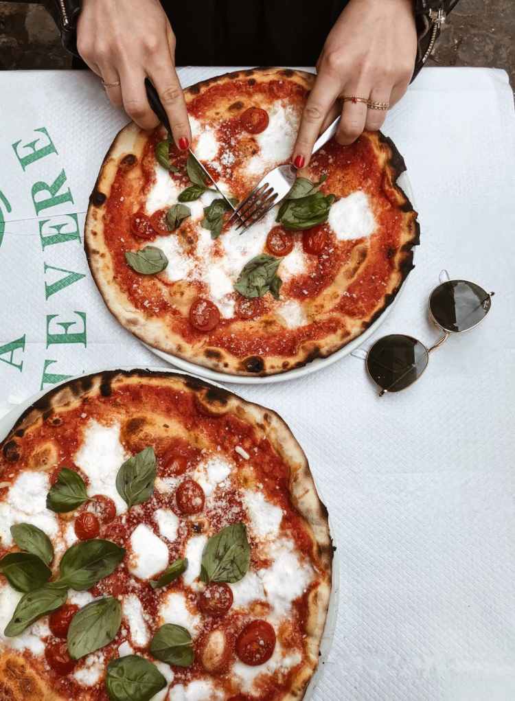 Weekend Event Guide | Friday 29 July-Sunday 31 July 2022 person slicing pizza