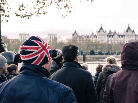 Crispin Hull / Misuse of Power, Wealth and Politics photo of group of people standing in front of building